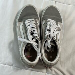 Grey and white Vans